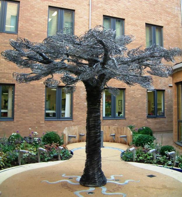 Norfolk & Norwich University Hospital: The Prayer/Wish Tree  took 6 miles of rolled steel to form the trunk and foliage. Made in sections to allow transport to through the chapel this centrepiece is used to attach ribbons of ‘hope’.